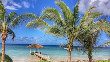 On the beach, sun loungers, beach towels