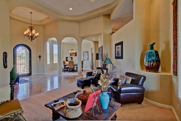 Formal Entry, living room, formal dining room, high ceiling.