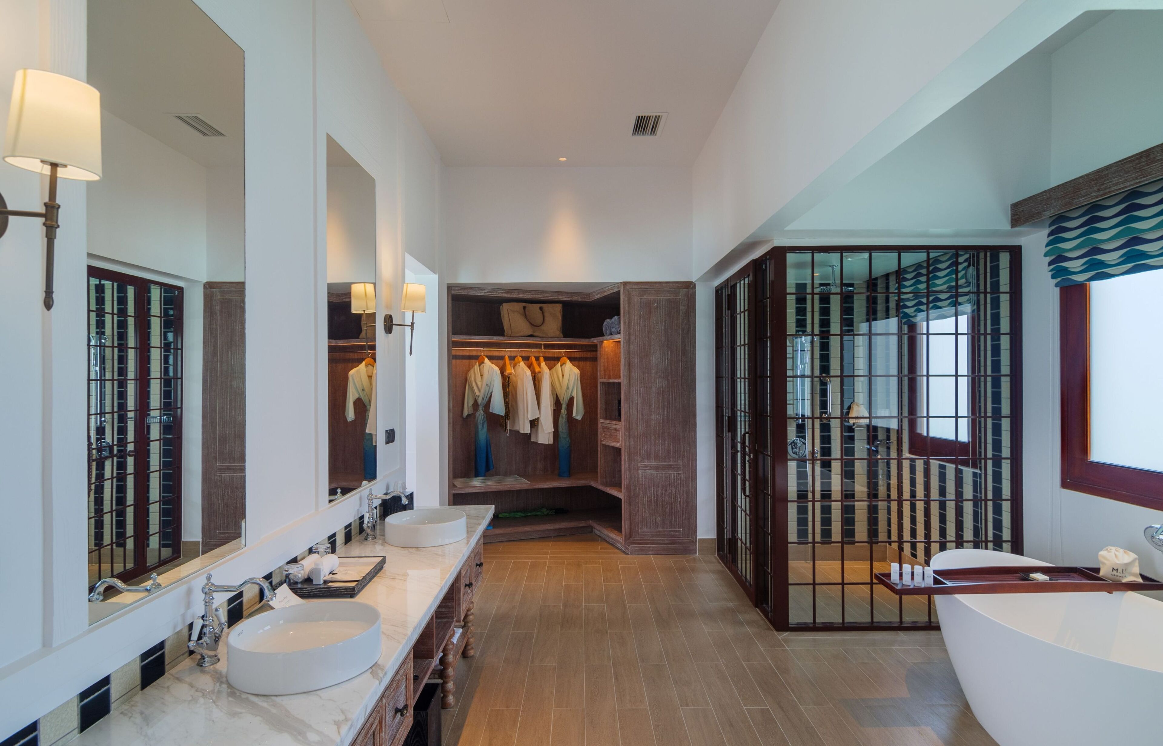 2-bedroom overwater pool villa | bathroom | free toiletries, hair dryer, bathrobes, slippers