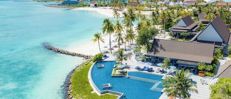 Outdoor pool, pool umbrellas, sun loungers