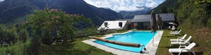 Seasonal outdoor pool, open noon to 8 PM, pool umbrellas