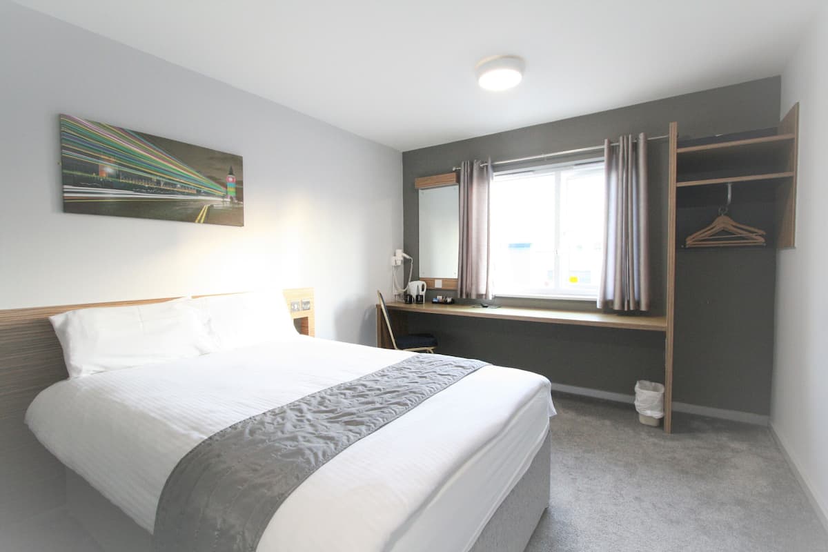 Desk, iron/ironing board (on request), WiFi (free), bed sheets
