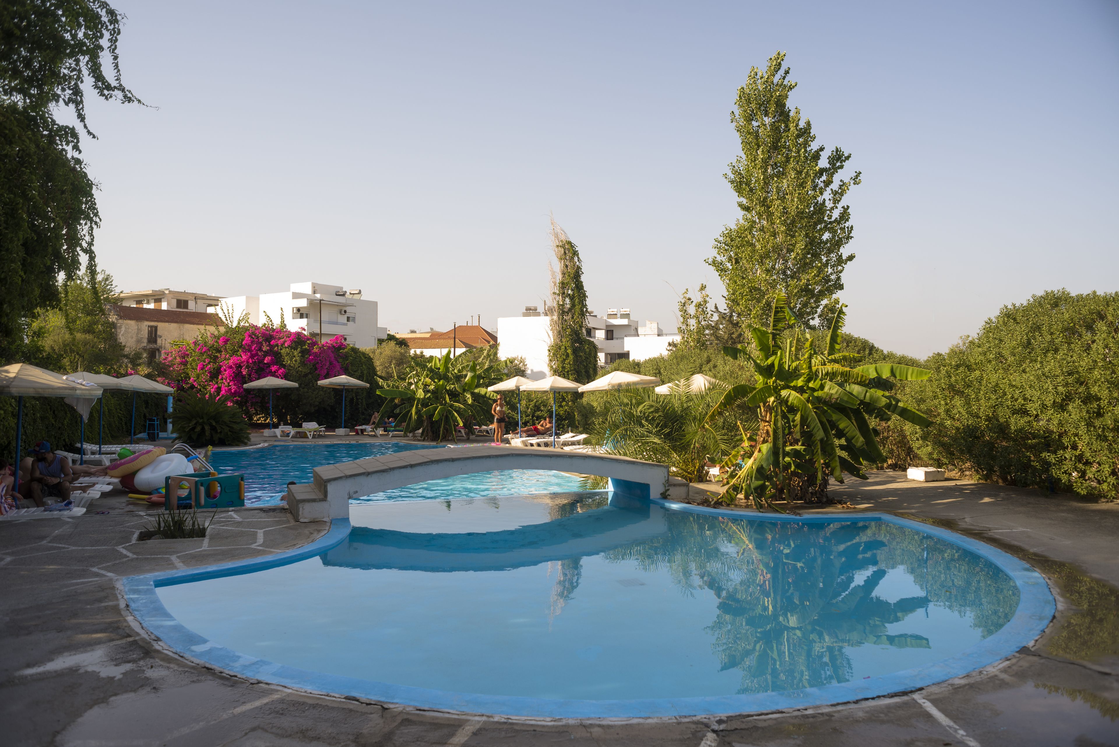 outdoor pool, pool umbrellas, pool loungers