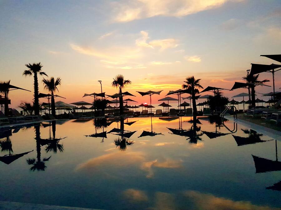 Indoor pool, 2 outdoor pools, open 7:00 AM to 6:00 PM, pool umbrellas