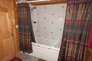 Separate tub and shower, towels