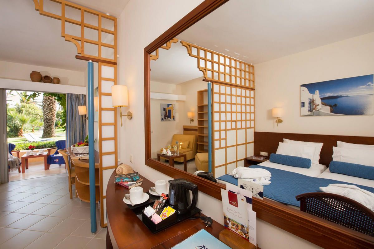 junior suite | living area | 21-inch lcd tv with satellite channels, tv