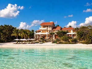 On the beach, sun-loungers, beach towels - Enjoy your own private beach in this Amazing Luxury Beachfront property!!! (Isla Mujeres)