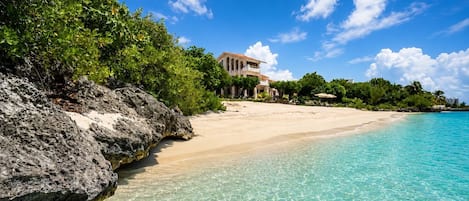 On the beach, sun-loungers, beach towels