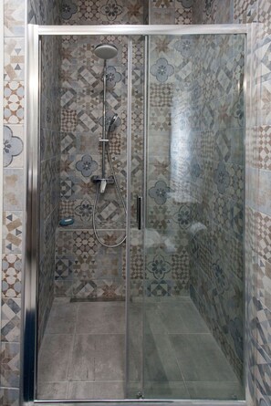 Shower, hair dryer, soap, shampoo