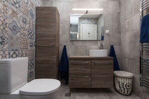 Shower, hair dryer, soap, shampoo