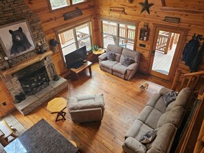 Smart TV, fireplace, DVD player, books