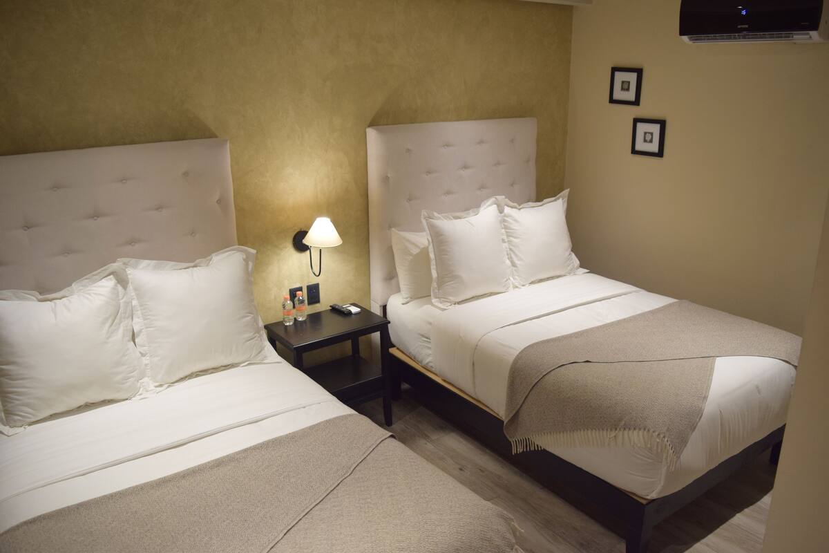 Deluxe Double Room, Multiple Beds | Minibar, in-room safe, soundproofing, free WiFi