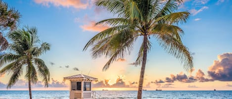 On the beach, sun-loungers, beach towels