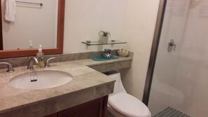 Shower, hair dryer, towels, soap