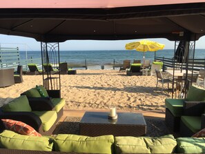 On the beach, sun loungers - Amazing Ocean Front 2 Story Home, Steps Away From The Water (Westerly)