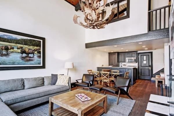 Enjoy vaulted ceilings, large windows and an open-concept living room.