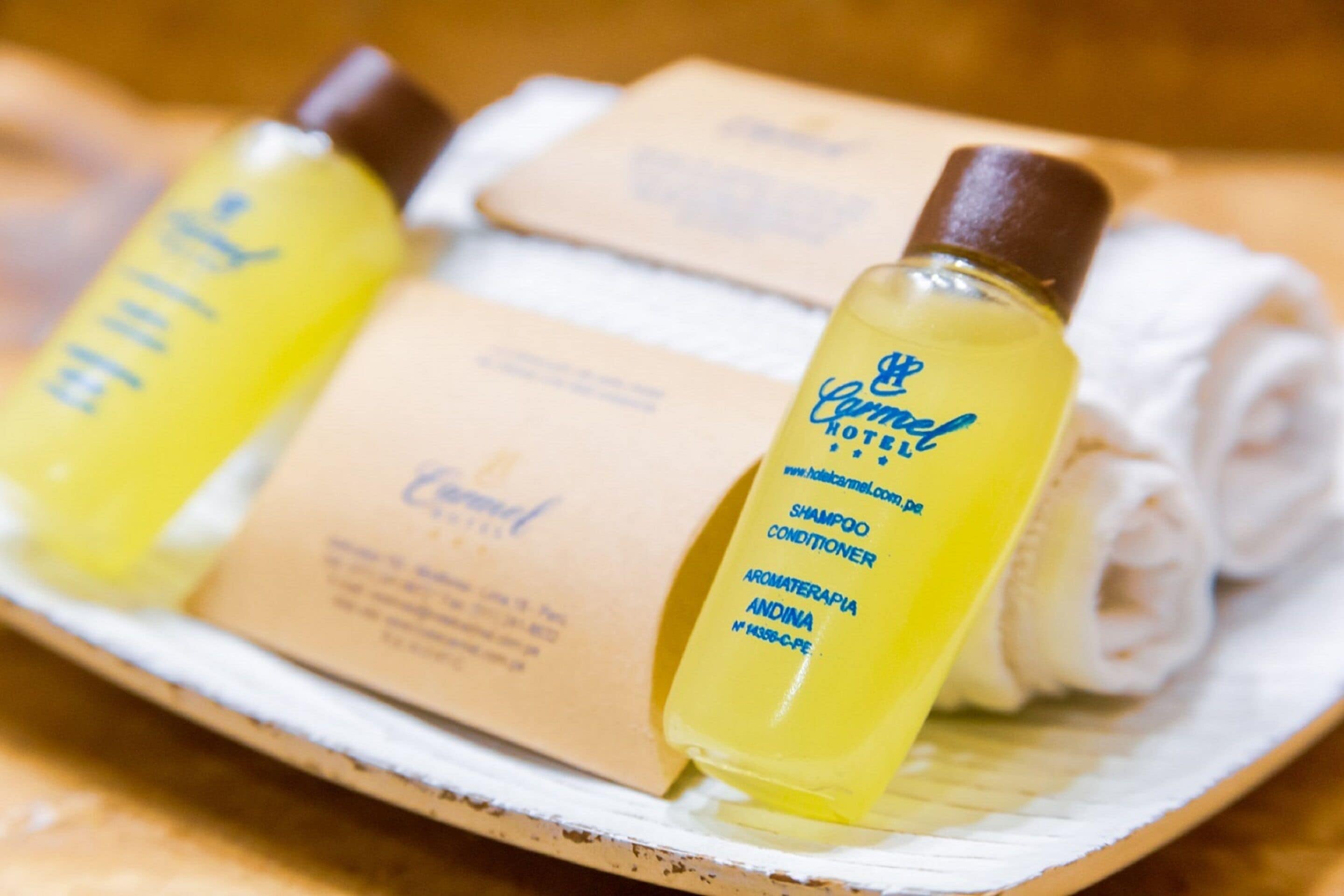 shower, designer toiletries, hair dryer, towels