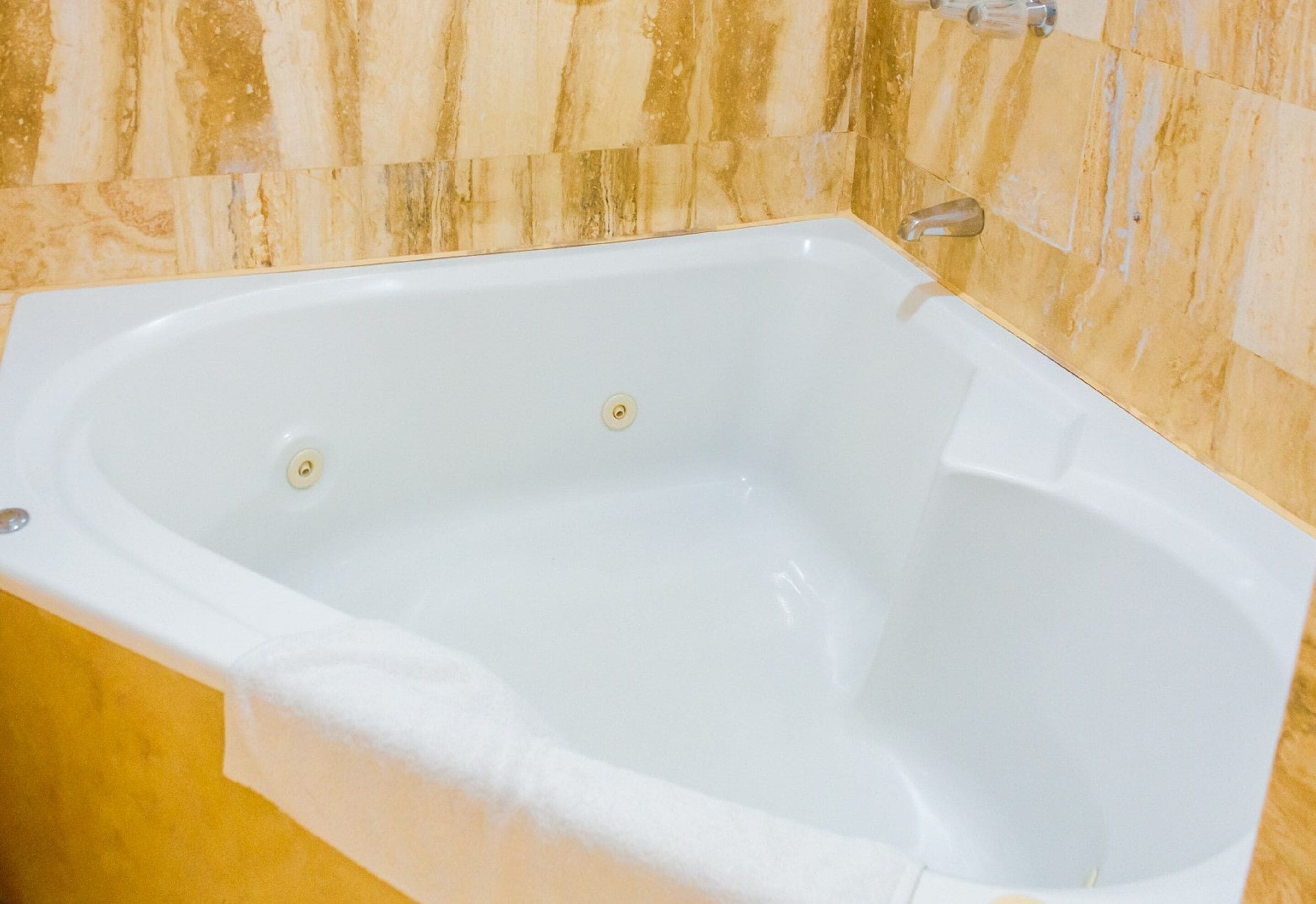 studio suite | bathroom | shower, designer toiletries, hair dryer, towels