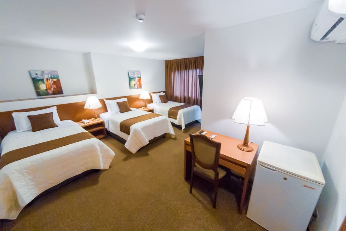 Triple Room | Minibar, in-room safe, desk, free WiFi