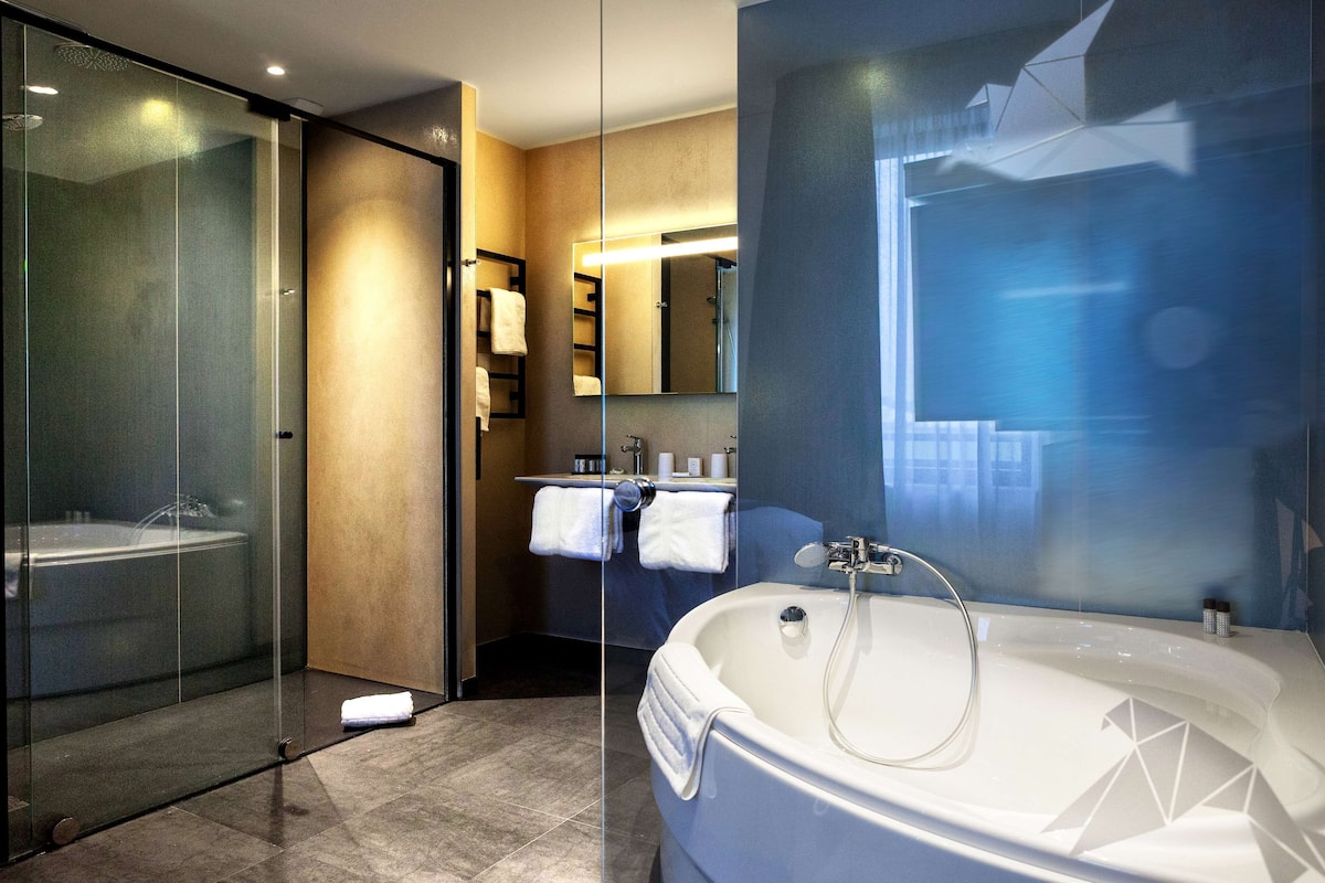 executive room, 1 king bed | bathroom | eco-friendly toiletries, hair dryer, towels, soap