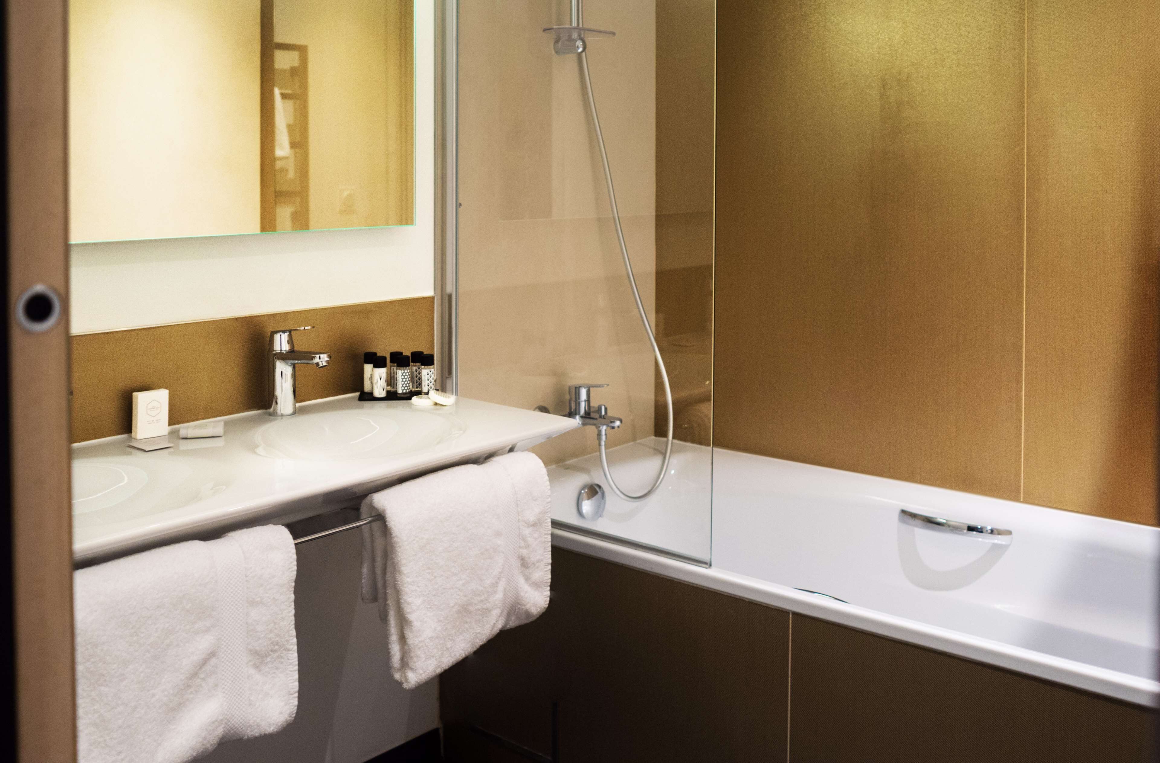 standard room, multiple beds | bathroom | eco-friendly toiletries, hair dryer, towels, soap