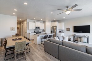 Townhome, Multiple Beds, Mountain View (18 Holes and A Hot Tub) | Living area | TV, fireplace, DVD player