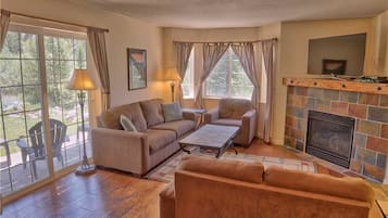 Family Apartment, 2 Bedrooms, Fireplace | Living area | TV, fireplace, DVD player