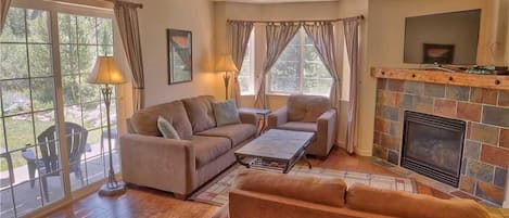 Family Apartment, 2 Bedrooms, Fireplace | Living area | TV, fireplace, DVD player