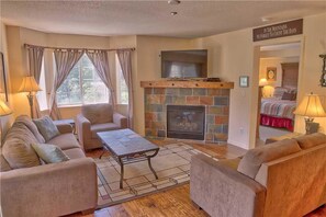 Family Apartment, 2 Bedrooms, Fireplace | Living area | TV, fireplace, DVD player - Villas at Swan's Nest #701 (Condo) Apartment 2 (Breckenridge)