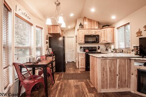 Cabin, 1 Bedroom | Private kitchen | Fridge, microwave, oven, stovetop