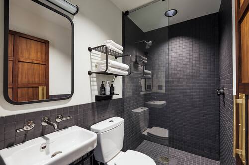 Shower, rainfall showerhead, hair dryer, towels
