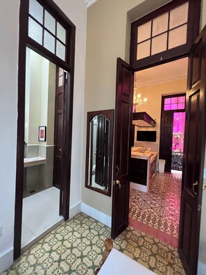 Deluxe Triple Room, Multiple Beds, Non Smoking | Bathroom | Shower, hair dryer, towels, soap