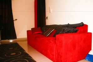Classic Apartment, 2 Bedrooms | Living room | 42-inch flat-screen TV with cable channels, TV