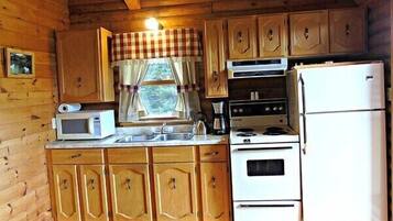 Réfrigérateur, micro-ondes, plaque de cuisson, cafetiÚre/bouilloire