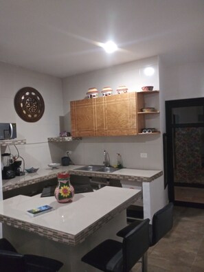 Fridge, microwave, coffee/tea maker, toaster