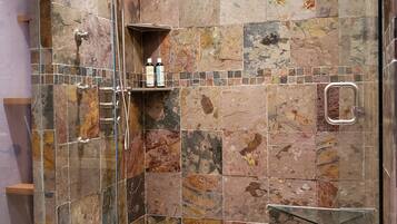 Bathtub, hair dryer, towels, soap