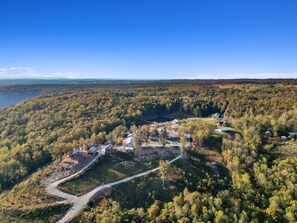 Surrounded by dense forest and rolling hills, this secluded community offers a peaceful retreat.