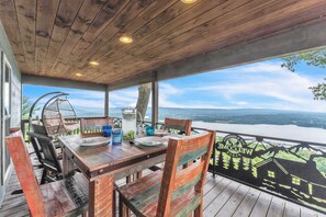 Outdoor dining - Pop & Granny's cabin with a fire pit, hot tub, & indoor pool! (Bryant)