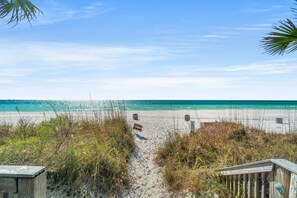 On the beach, sun-loungers