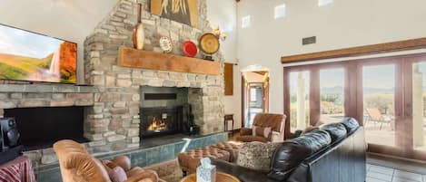 TV, fireplace, books, stereo