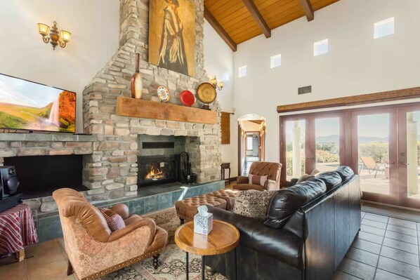 TV, fireplace, books, stereo