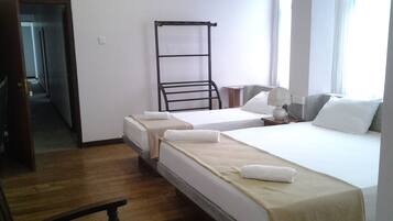 Standard Triple Room | 8 bedrooms, iron/ironing board, cribs/infant beds, rollaway beds