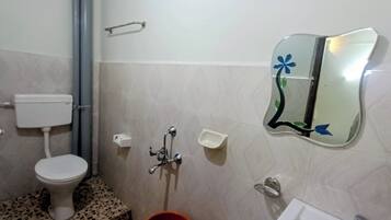 Standard AC | Bathroom | Shower, rainfall showerhead, free toiletries, towels