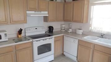 Family Villa, Private Pool, Garden Area | Shared kitchen | Fridge, microwave, oven