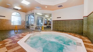 A large indoor hot tub with a tiled floor, a handrail, and a glass door leading to a room with exercise equipment. - Ov3637 - Regal Palms Resort & Spa - 4 Bed 3.5 Baths Villa (Davenport)