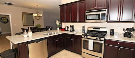 Family Villa, Balcony, Garden Area | Shared kitchen