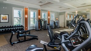 A gym with treadmills, weight machines, and dumbbells. - Ov3223 - Solterra Resort - 5 Bed 5 Baths Villa (Davenport)