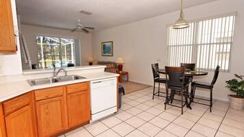 Family Villa, Balcony, Garden Area | Shared kitchen | Fridge, microwave, oven