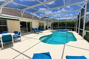 Seasonal outdoor pool, pool umbrellas, pool loungers