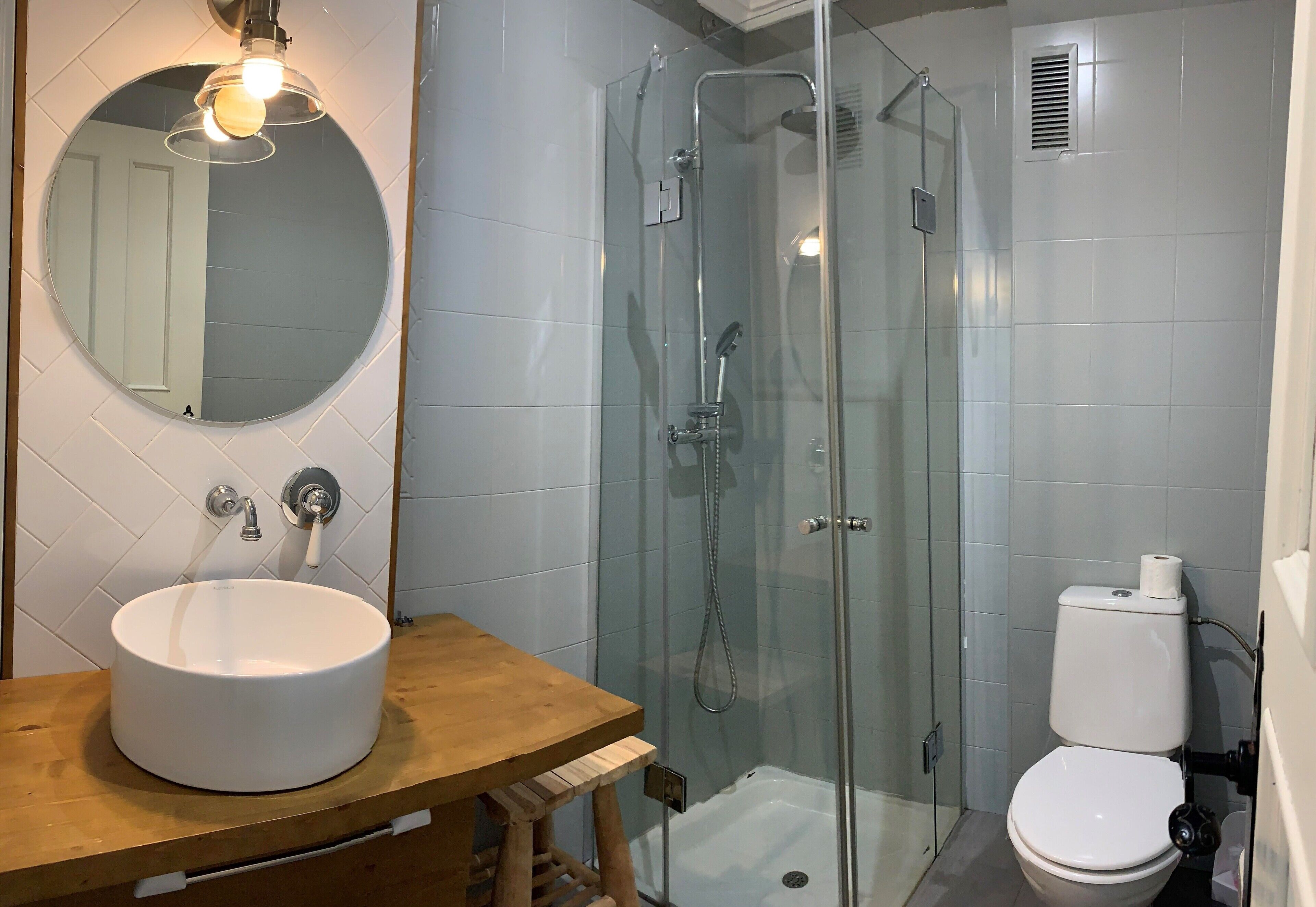 deluxe double room | bathroom | shower, rainfall showerhead, towels